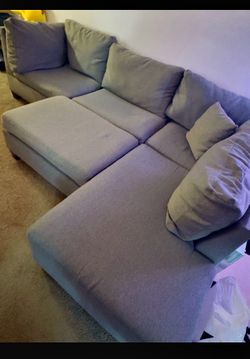 Beautiful Grey sectional couch with Ottoman