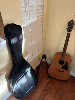 Oscar Schmidt guitar + Stand + Case