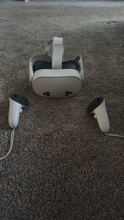 VR Headset with Two Controllers