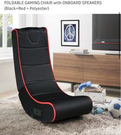 Foldable gaming chair onboard speaker