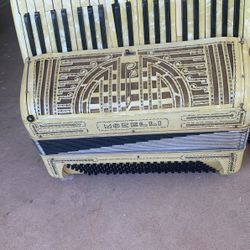 Very Old accordion needs work  with case asking $50