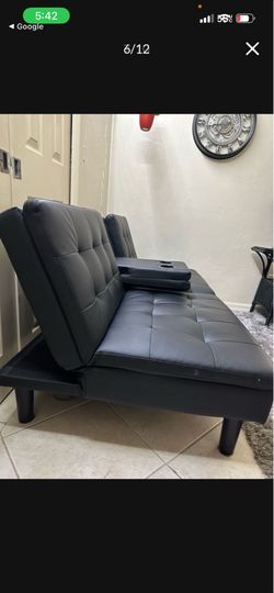 ((FREE DELIVERY)))Black Faux Leather Futon Sofa Bed with Cup Holders and usb connector