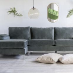 Couch WithLeft Facing Chaise Couch. Grey Velvet Like Upholstery. Used For Staging 1 Month. 