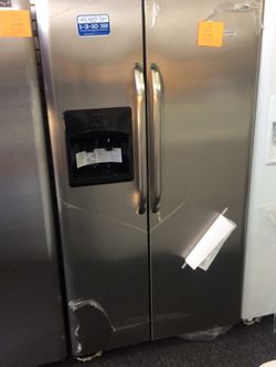 Side by side refrigerator open box never used