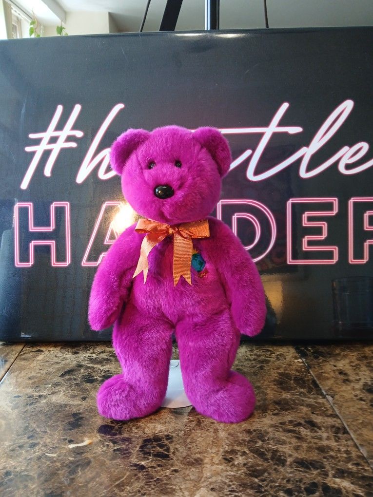 Millennium TY Beanie Plush 14in retired Bear
The product is a 14" Ty Beanie Buddy Buddies plush bear in Magenta color, released in the year 2000. It