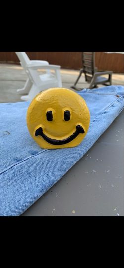 Yellow double sided Smiley Face Cast Figurine