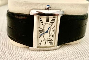 Mens size watch.  Quartz.