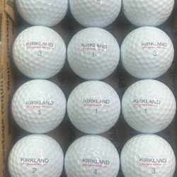 12 Kirkland White Golf Balls 5/4a Lot D040