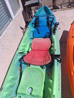 Two kayaks ready for the water.