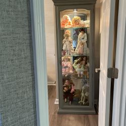 Eight Dolls And Doll Case