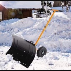 New- rolling snow pusher