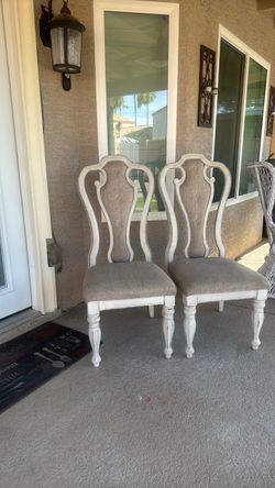 2 white chairs $40