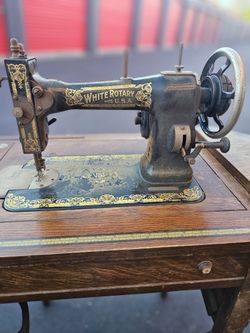 White Rotary Sewing Machine $75