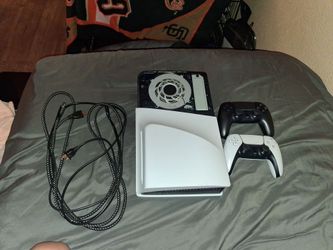 Ps5 hdmi cord, power cord, and 2 controllers