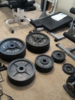 Body Solid and Standard Barbell Cast Iron Weight Plates 740 pounds or BUY SINGLE PLATES AT $1.28 PER POUND----
