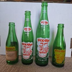 SET OF 4 VINTAGE KICKAPOO JOY JUICE BOTTLES