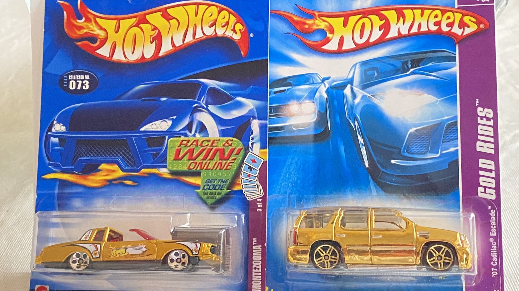 Hot Wheels Gold Rides ‘07 Cadillac Escalade And Gold MONTEZOOMA (2 Car Lot)