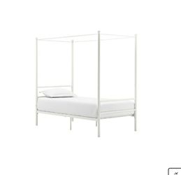 New in box twin canopy bed with mattress