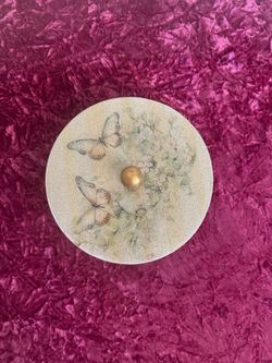 Handmade wooden decorative box with lid. Beautiful hand-painted butterfly design on the lid and matching details on the body. The lid features a soft,