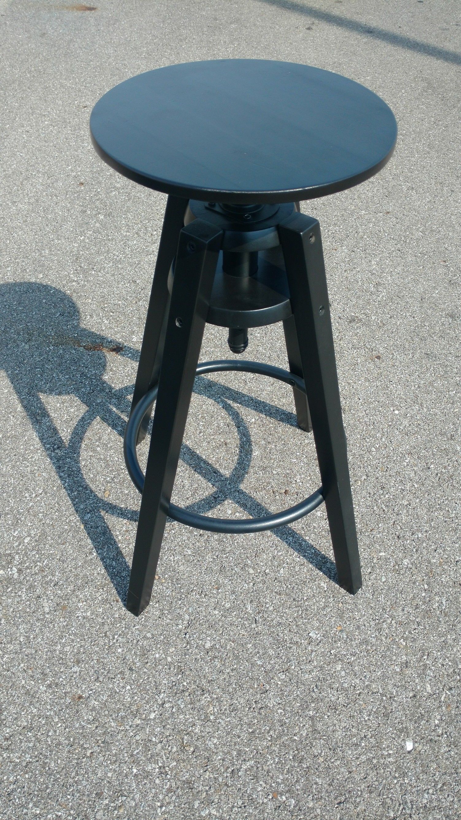 Black wooden adjustable-height photographers posing stool