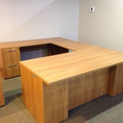 NEW! U group desk with two filing pedestals. Matching items available. 

