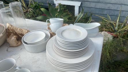 White dishes plus gravy, and casserole dish
