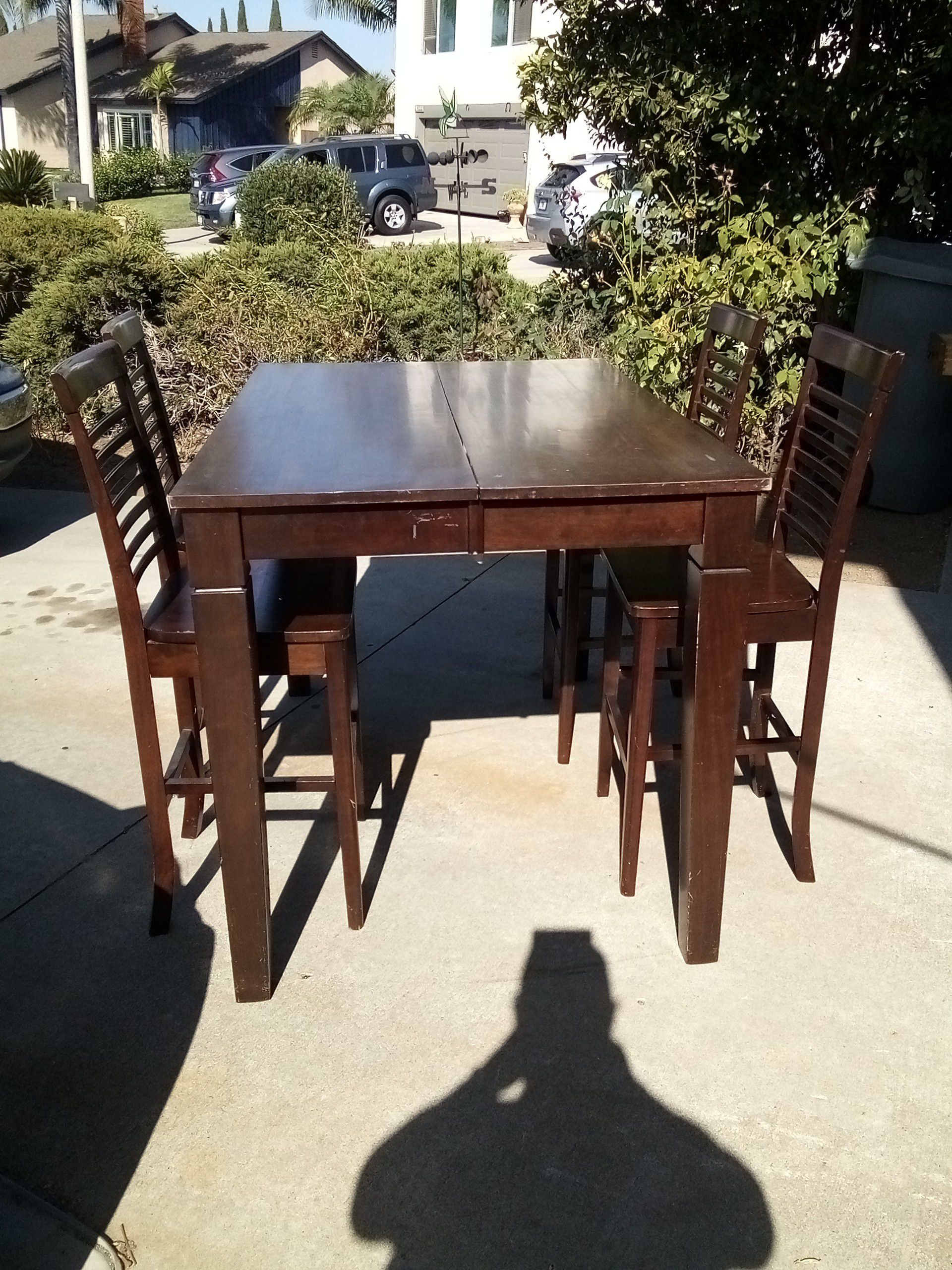 Dinning table 3ft wide x 4ft long x 3ft tall kitchen table. 4 chair's. Has an 18 inch wide leaf (rarely used). O.B.O
