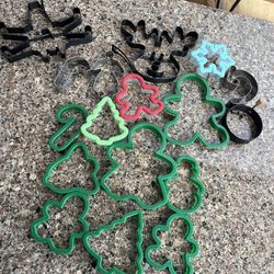 Assortment of cookie cutters  Star Wars ship Reindeer Candy cane Christmas tree  Gingerbread man  Gingerbread woman  Snowflake and more 