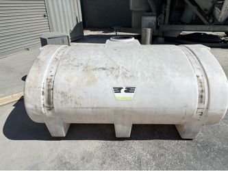 Free empty 550 gallon water tank has a cut on side