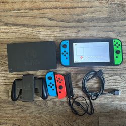Nintendo Switch + Accessories 