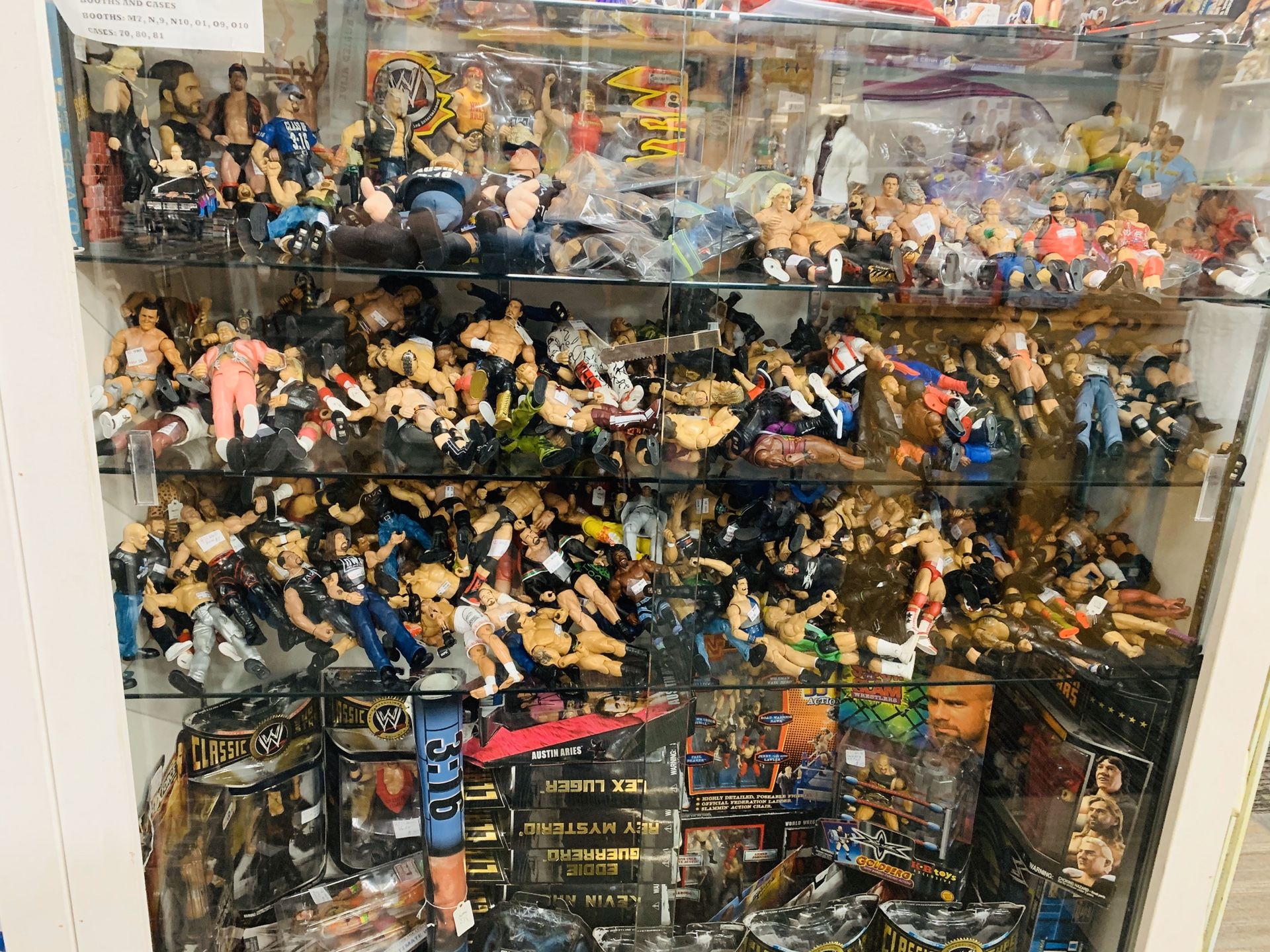 WWF WWE Wrestling Figures lots of new figures. Bobbleheads, pops, sports items, Disney pins, championship rings