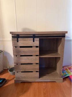 Cabinet with sliding door