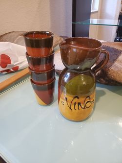 Artesian wine jar and glasses