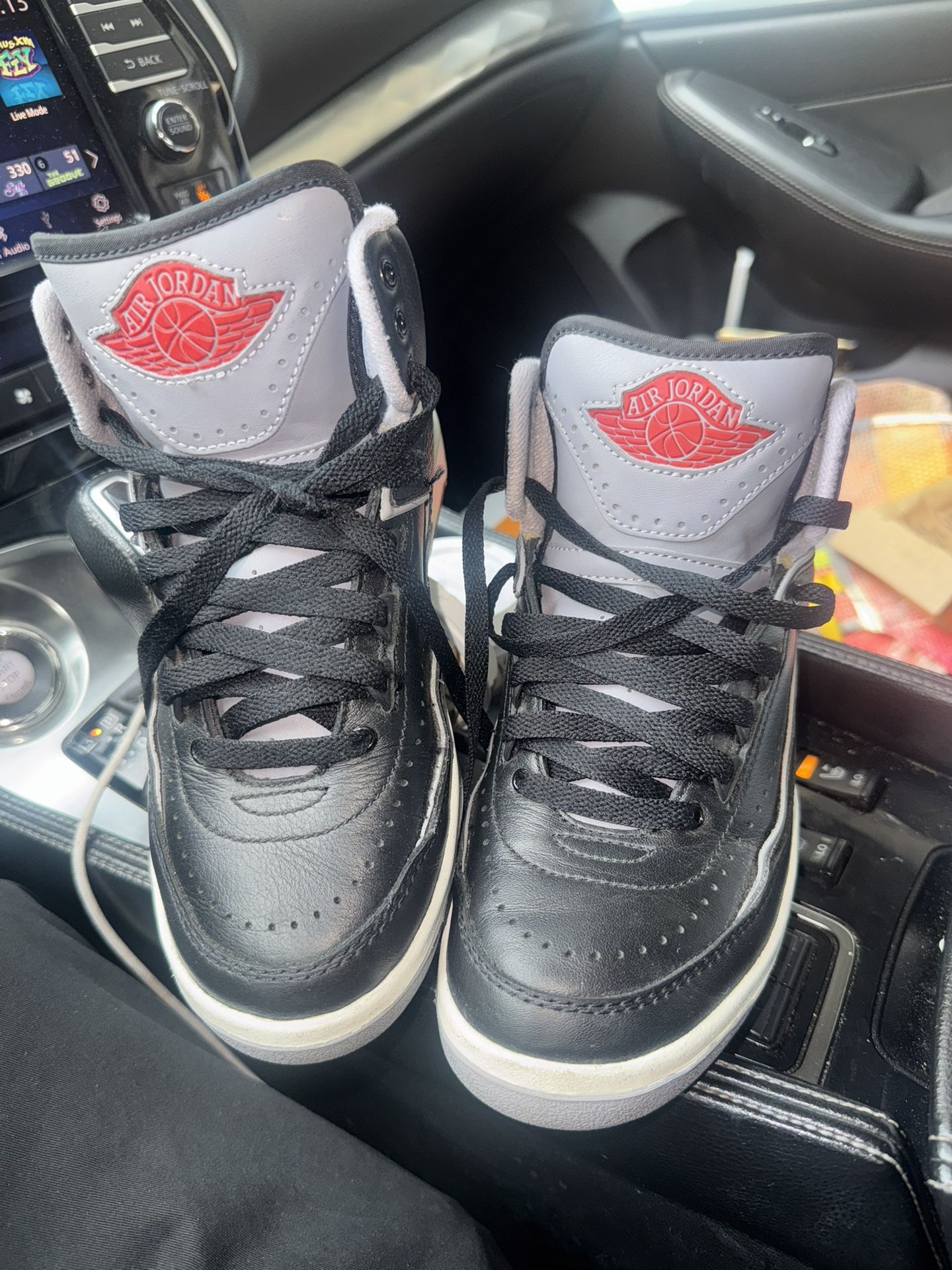 2 Pairs Jordans 1 a Size 4 And One Size 5 And Timberland Boots Size 5