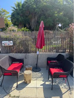 4-Piece Wicker Patio Furniture Set with Red Cushions