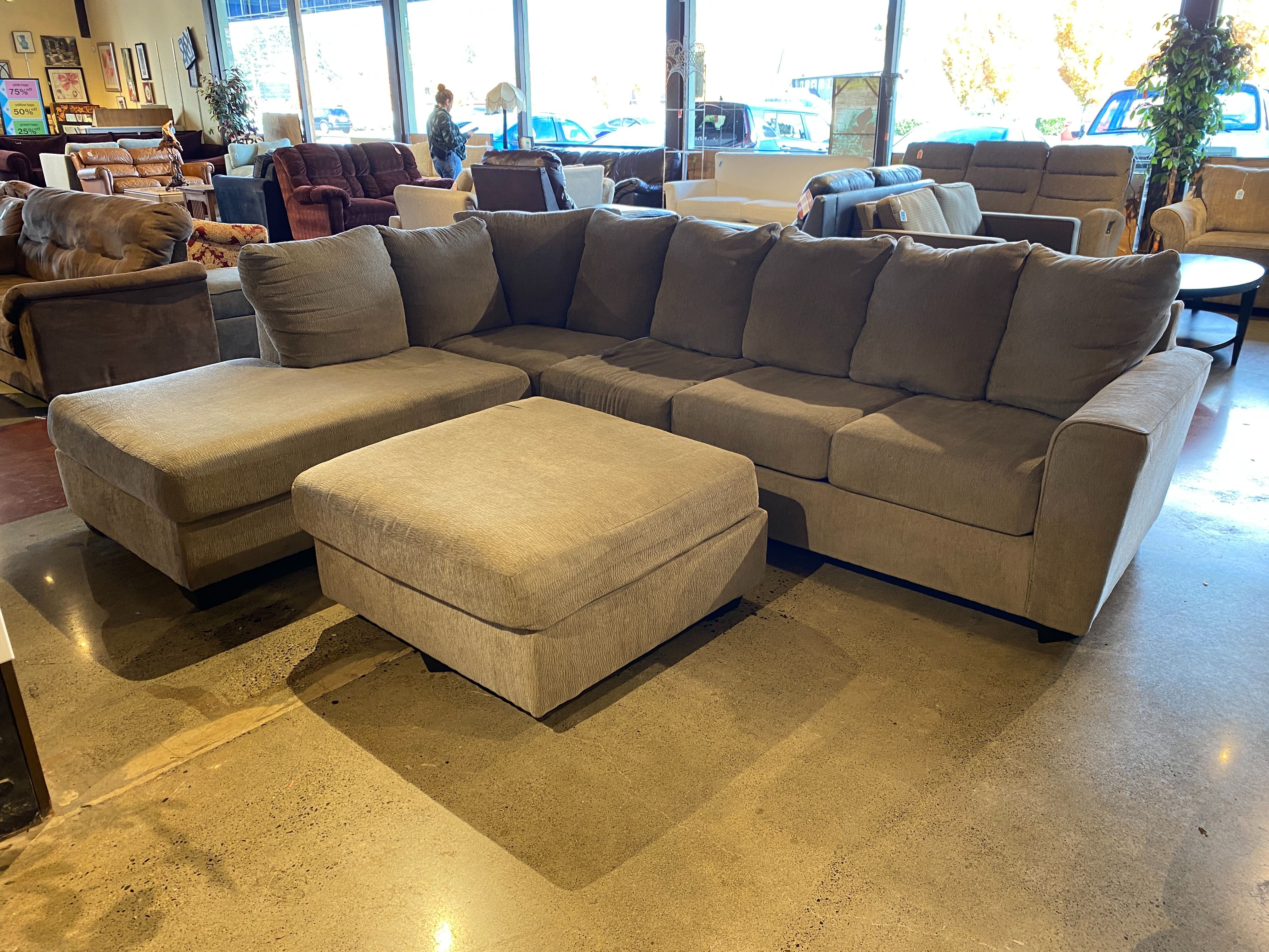 Spacious Grey 2Pc. Sectional w/ Ottoman