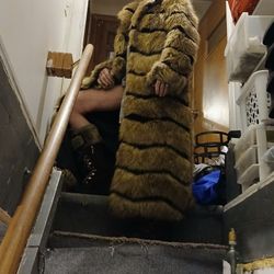 Gentlemen,  Just in time for that perfect gift  for your wife or that special lady in your life. A beautiful  full Length fox fur coat and boots