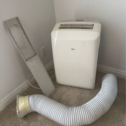 LG floor air conditioning unit with connection tube to window