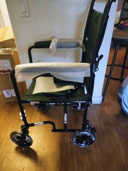 BRAND NEW WHEELCHAIR