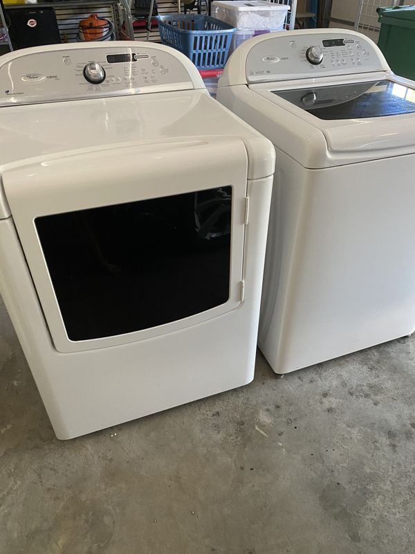 White Whirlpool he top load washer/dryer combo for Sale in West