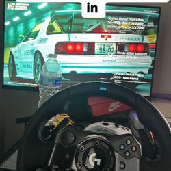 Logitech racing Wheel  And Xbox With Monitors 