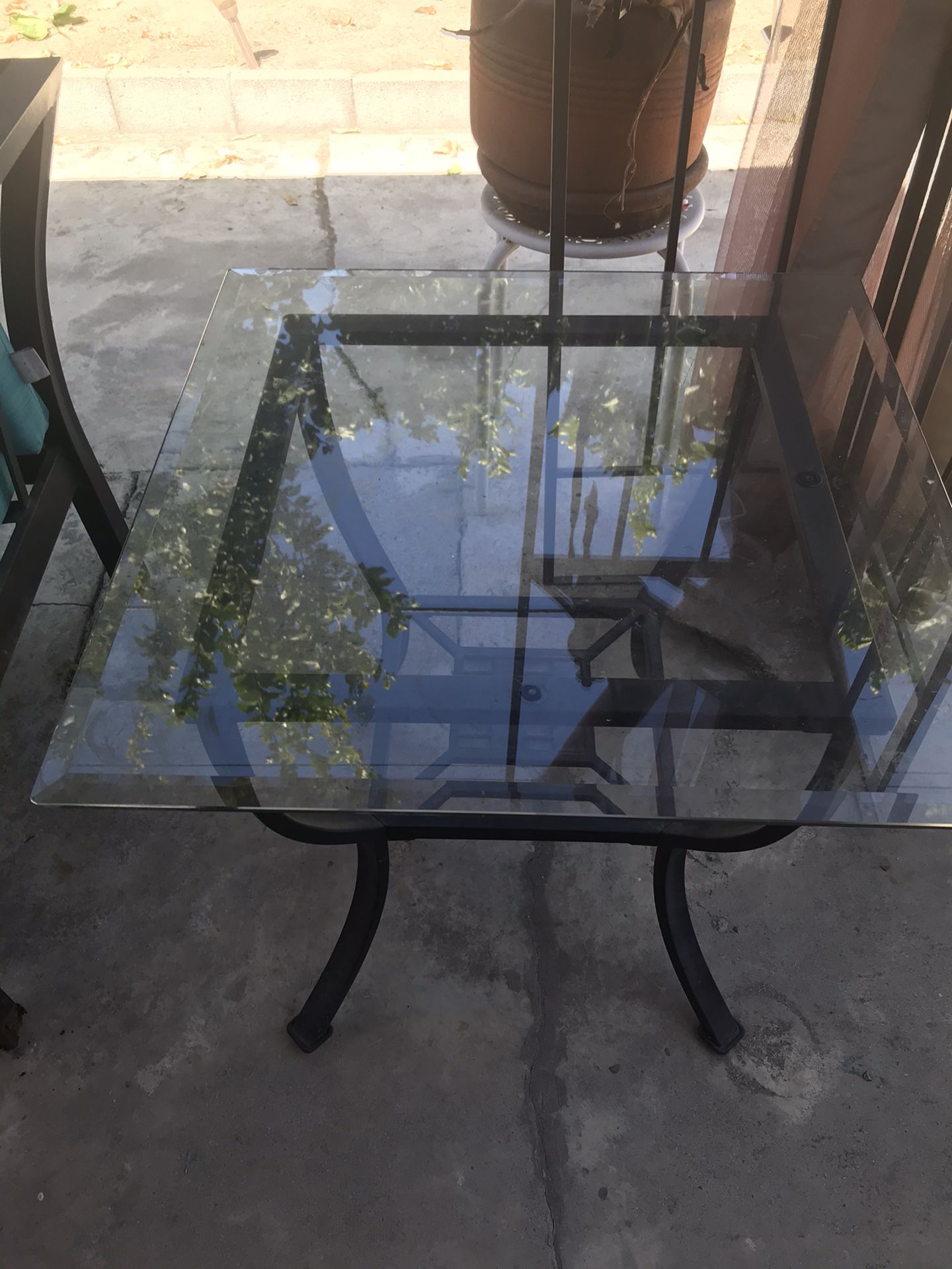 Rod iron and glass coffee table and 2 end tables