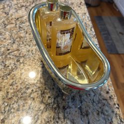 Decorative Bathtub Gold Colored With Bubble Bath And Shower Gel