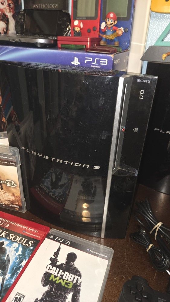 Original PS3 Fat 40GB With 4 Games