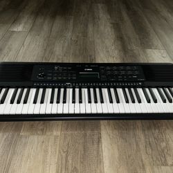 Yamaha PSR-E283 61-Key Portable Keyboard With Power Adapter