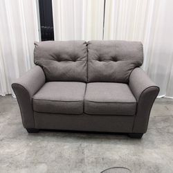 Gray Textured Fabric Loveseat with Tufted Cushions