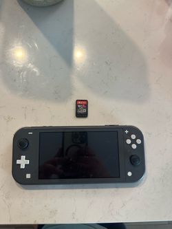 Gray Nintendo switch lite with splatoon 2