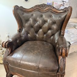 Antique carved oak chair with original leather 