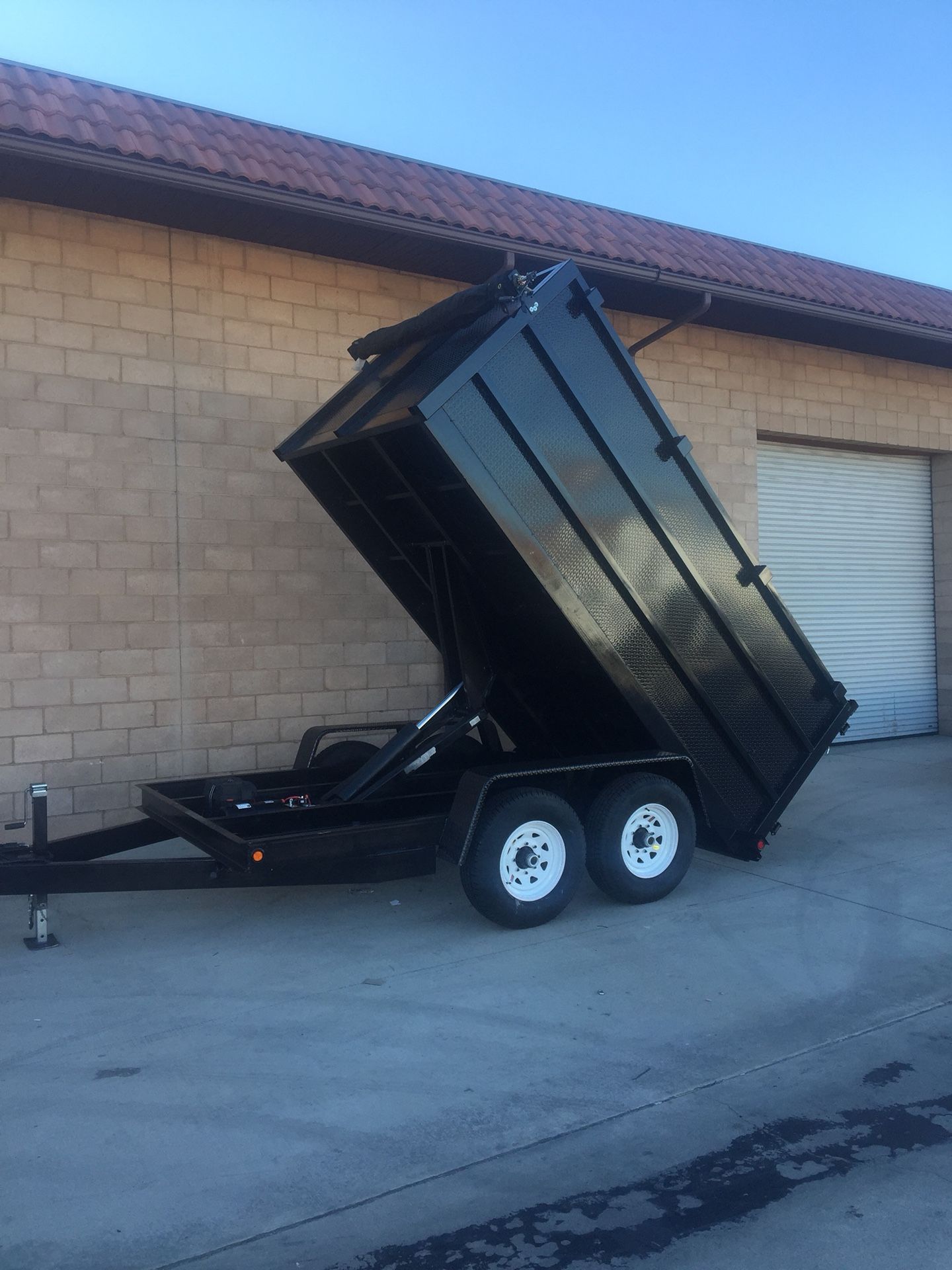 Brand new 8x12x4 HD dump trailer