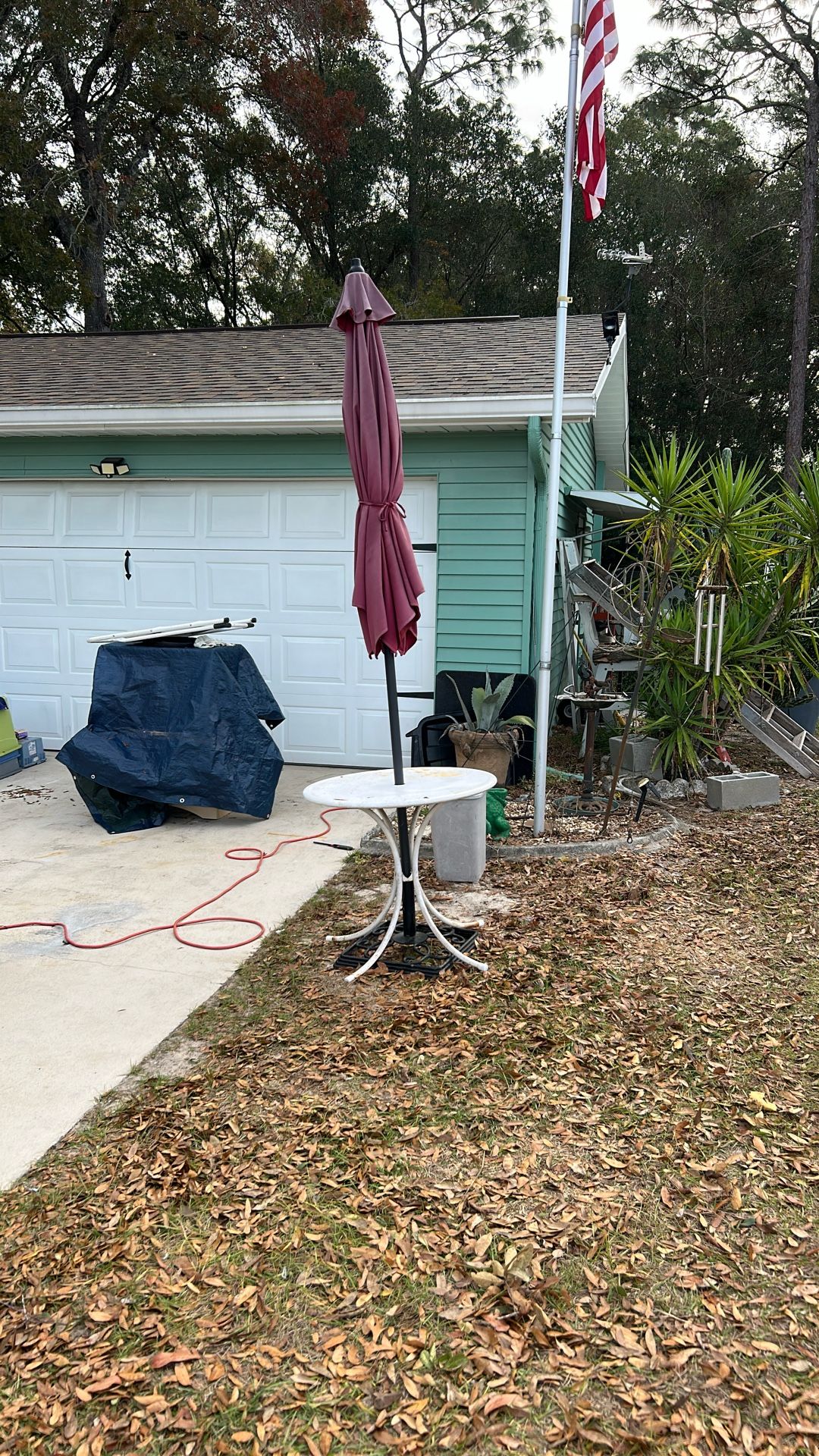 Umbrella And Small Metal Table